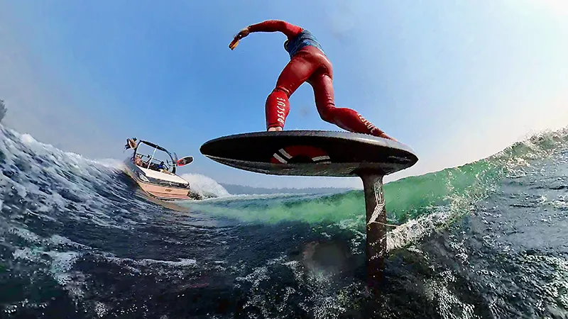Wake foiling lesson behind a boat
